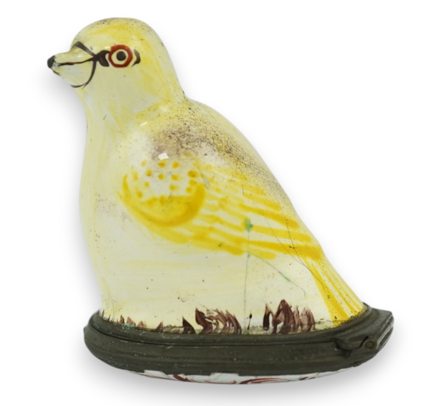 An 18th century South Staffordshire (Bilston) enamel box modelled as a canary with floral decorated lid, 4.5cm high. Condition - fair/poor